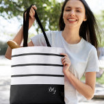 Elegant Modern Bold Stripe Monogram Initials Black Tote Bag<br><div class="desc">Elegant contemporary design features a mix of thick bands and thin stripes in crisp white and modern sophisticated black.  Add two or three monogrammed initials in stylish white script. Design repeats on back.  Custom colour requests accepted.</div>