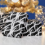 Elegant, Modern, Fancy Black and White Wedding Wrapping Paper<br><div class="desc">The design features a white togetherness script in an elegant and unique pattern on black background, to celebrate the bride's and groom's special day. Design related items available at the WD Art Zazzle Store. For special requests or questions, contact the artist at wafadahdalcreates@gmail.com. © Wafa Y. Dahdal - All Rights...</div>