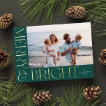 Elegant Modern Merry & Bright 1 Photo Green Gold  Foil Holiday Card<br><div class="desc">This festive holiday photo card features one horizontal photo,  elegant yet simple typography,  and a beautiful deep green background. The raised foil greeting on the front says "Merry & Bright".  You can also add another photo and/or additional text to the back!</div>