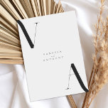 Elegant Modern Minimalist Black and White Wedding Invitation<br><div class="desc">Modern Minimalist Black and White Wedding Invitation. Features elegant monogram typography and minimal graphic design. Personalize text with all the details of your special day.</div>