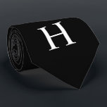 Elegant Modern Monogram Black Tie<br><div class="desc">Black & White Classic Elegant Modern Minimalist Monogram Tie Elevated, classic and timeless, this simple monogram black tie features a bold monogrammed initial in a minimalist, traditional design. Perfect for personalized style on the go - for your black tie affair, wedding, groomsmen, best man, groom, prom or special event. Personalize...</div>