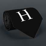 Elegant Modern Monogram Black Tie<br><div class="desc">Black & White Classic Elegant Modern Minimalist Monogram Tie Elevated, classic and timeless, this simple monogram black tie features a bold monogrammed initial in a minimalist, traditional design. Perfect for personalized style on the go - for your black tie affair, wedding, groomsmen, best man, groom, prom or special event. Personalize...</div>