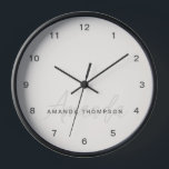 Elegant Modern Personalized With Name Monogram Clock<br><div class="desc">Elevate your home decor with our Cream Elegant Modern Personalized With Name Monogram Clock. This finely crafted wall clock seamlessly blends contemporary aesthetics with a personalized touch, making it a stylish and functional addition to any room. Featuring your name and a monogram, this clock adds a touch of sophistication and...</div>