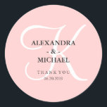 Elegant Modern Pink Monogram and Thank You Classic Round Sticker<br><div class="desc">These stylish wedding stickers have a trendy rose quartz pink coloured background,  and a large white calligraphy monogram.</div>