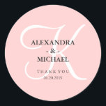 Elegant Modern Pink Monogram and Thank You Classic Round Sticker<br><div class="desc">These stylish wedding stickers have a trendy rose quartz pink coloured background, and a large white calligraphy monogram.</div>