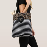 Elegant Monogram black Leopard Animal Print Tote B<br><div class="desc">An elegant black leopard animal print and black and white striped monogram tote bag for everyday or back to school. Add your name and initial  on the front and back. Designed for you by Blackberry Boulevard.</div>