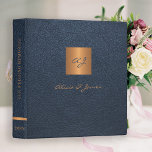 Elegant monogram gold navy script wedding album binder<br><div class="desc">Luxury exclusive looking monogrammed scrapbook wedding album binder featuring a faux gold copper metallic square over a stylish dark navy blue faux leather background.</div>