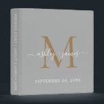Elegant Monogram Grey & Gold Script Wedding Album Binder<br><div class="desc">Chic wedding album with your stylish monogram initial in gold and your names in white elegant handwritten script calligraphy on a silver grey background. Simply add your names, monogram and wedding date. A beautiful wedding keepsake gift album for all your wedding photos and memories. Exclusively designed for you by Happy...</div>