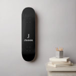 Elegant Monogram Initial Name Personalized Black Skateboard<br><div class="desc">Modern simple masculine stylish with black and white trendy typography (changeable colours). Personalized gift for him: dad,  father,  husband,  son,  boyfriend,  groom,  best man,  groomsmen</div>