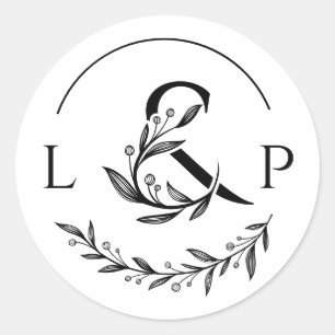 Elegant monogram with floral ampersand invite classic round sticker