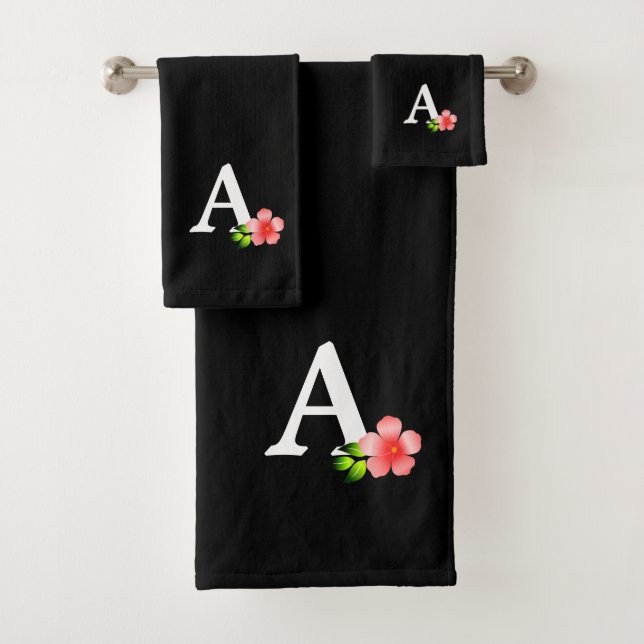 Élégant monogramme blanc avec fleur rose sur noir (En situation)