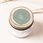Elegant Moon and Stars Sage Green Wedding Favour Classic Round Sticker<br><div class="desc">Add a personalized touch to your envelopes, wedding favours, and more with these Elegant Moon and Stars sage green wedding stickers. The design features a white line art illustration of a moon adorned with stars and foliage on a sage green background. Your names and wedding date are displayed in white...</div>