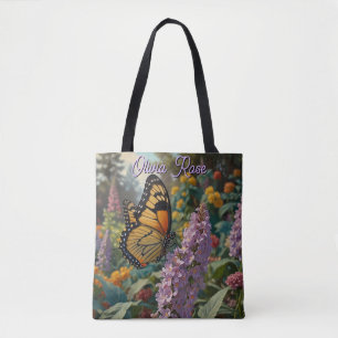 Elegant pastel wildflower garden with butterfly tote bag