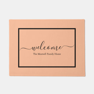 Elegant peach black script family name welcome doormat