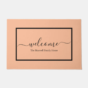 Elegant peach script family name welcome doormat