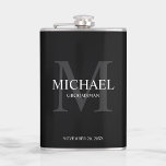 Elegant Personalized Groomsmen Monogram and Name Hip Flask<br><div class="desc">Add a personal touch to your wedding with personalized groomsmen flask.
This flask features personalized groomsman's name with title and wedding date in white and monogram in light grey as background,  in classic serif font style,  on black background.

Also perfect for best man,  father of the bride and more.</div>