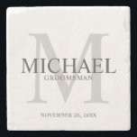 Elegant Personalized Groomsmen Stone Coaster<br><div class="desc">Add a personal touch to your wedding with personalized groomsmen stone coaster.
This coaster features personalized groomsman's name with title and wedding date in grey and monogram in light grey as background,  in classic serif font style.

Also perfect for best man,  father of the bride,  ring bearer and more.</div>