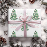 Elegant Pink And Green Happy Holidays Family Name Wrapping Paper<br><div class="desc">Watercolor Nordic Spruce Christmas Tree with pink and white Chinoiserie ornaments. These elements were handpainted by yours truly before being arranged into a repeating pattern with the ability to add personalized text.</div>
