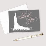 Elegant Pink Charcoal Wedding Gown Bridal Shower Thank You Card<br><div class="desc">Elegant bridal shower or wedding "Thank You" note cards for the stylish bride-to-be features an ornate calligraphy script font and flowing wedding gown. Scroll flourish, flower and butterfly details accent the ethereal dress. Folded card format includes space on the inside for a handwritten message. Design colours include colours include white,...</div>