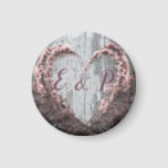 Elegant pink flower heart rustic barn wood wedding magnet<br><div class="desc">This beautiful elegant, classic and modern wedding item features a heart made of real “bridal wreath” Spirea Flowers. The couple's initials looks really cute nestled inside the heart. I put the heart on a rustic, distressed, grey barn wood background with dusty rose pink accents. Very easy to customize. This item...</div>