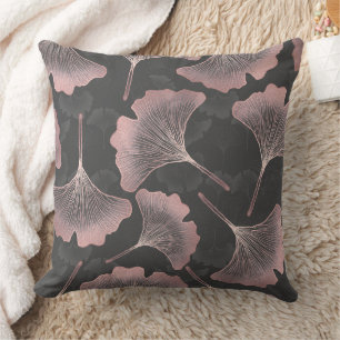 Elegant Pink Ginkgo Leaves on Black Background Throw Pillow