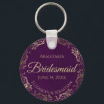 Elegant Plum Purple & Gold Bridesmaid Wedding Gift Keychain<br><div class="desc">These keychains are designed to give as favours to bridesmaids in your wedding party. They feature a simple yet elegant design with a deep plum purple coloured background, gold script lettering, and a lacy golden faux foil floral border. The text says "Bridesmaid" with space for her name, the names of...</div>
