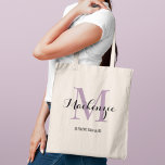 Elegant Purple Custom Wedding Bridesmaid Name Tote Bag<br><div class="desc">Elegant custom wedding tote bag features a personalized monogram typography design with modern calligraphy script name and serif monogram initial in lavender purple and black colours. Includes custom text for a bridal party title like "BRIDESMAID" or other preferred wording.</div>