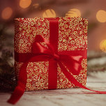 Elegant Red & Gold Swirls Pattern Boho Christmas Wrapping Paper<br><div class="desc">Experience the captivating elegance of a swirled design featuring shades of deep red and gold that will elevate your crafts and gifts into a work of art.</div>