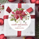 Elegant Red Poinsettia Christmas Happy Holidays Classic Round Sticker<br><div class="desc">Lovely festive stickers / seals with hand painted watercolor poinsettia bouquet flowers and holly in green and deep red berry colours. Easy to edit by adding your text. HAPPY HOLIDAYS or MERRY CHRISTMAS . Add these to your family and friend gifts during the holiday season. Get matching items in collection!...</div>