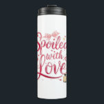 Elegant Red Script with Champagne Thermal Tumbler<br><div class="desc">Celebrate a life full of affection with this glamorous "Spoiled with Love" graphic. Featuring elegant red script, popping champagne, and an array of sparkling hearts, this design is a perfect declaration of being cherished and pampered. It's a wonderful, celebratory piece for Valentine's Day, an anniversary, or any day you feel...</div>