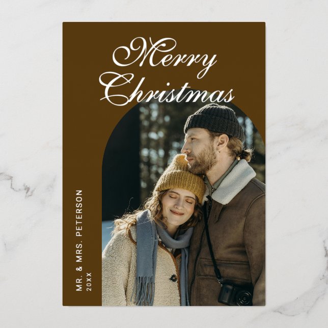 Elegant Script Arch Newlyweds Photo Brown Silver Foil Holiday Card (Front)