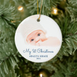 Elegant Script Baby's First Christmas Photo Ceramic Ornament<br><div class="desc">This round Christmas ornament offers a baby's first Christmas theme. The text "My 1st Christmas" appears in an elegant blue script. Custom text allows you to add the name and year of your newborn.</div>