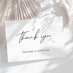 Elegant Script Black White Wedding Thank You Postcard<br><div class="desc">Simple and Modern Calligraphy Script Thank You Postcard in black and white to send out after your wedding. Customize it with your own names on the front and message on the back or delete the text on the back and add your handwritten note.</div>