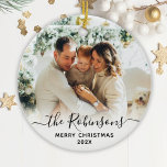 Elegant Script Family Name Photo Merry Christmas   Ceramic Ornament<br><div class="desc">Elegant Modern Black White Hand Lettered Script "Family Name" Merry Christmas Photo Ornament. Features a family photo, "family name" calligraphy text in handwritten script, with Merry Christmas text and year photo overlay (in black and white). Easy to personalize it. Photo tip: crop your photo to square form before upload it....</div>