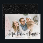 Elegant Script Full Photo Hope Love Hugs Black Holiday Card<br><div class="desc">Send love this season to your family and friends with these modern styled cards by Orabella Prints. Elegant text overlay reads, "hope, love, & hugs" in black over a white gradient overlay on the bottom of the card. The back features tiny white snow dots over a black background, which can...</div>
