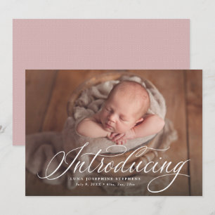 Elegant script introducing one photo pink birth announcement