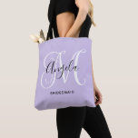 Elegant Script Monogram Pale Lavender Bridesmaid Tote Bag<br><div class="desc">Girly personalized monogram with a fancy calligraphy script pairing in pale lavender, black and white. Create your own thank you gift for a bridesmaid. Customize the background and font colours to match your wedding palette. The fancy flourish that is part of the monogram may need to be re-centred for your...</div>