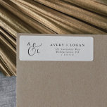 Elegant Script Monogram Return Address Label<br><div class="desc">These elegant script monogram return address labels are perfect for a simple wedding. The minimalist black and white design features fancy romantic typography with modern glam style. Customizable in any colour. Keep the design minimal and classy, as is, or personalize it by adding your own graphics and artwork. These labels...</div>