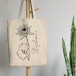 Elegant Script Name Lotus July Birth Month Flower Tote Bag<br><div class="desc">Elegant,  minimalist and modern black hand drawn water lily or lotus flower,  July birth month flower with customizable name in elegant script,  personalized gift for any occasion,  including Birthdays,  gifts for bridesmaids,  best friends,  Christmas,  and more.</div>