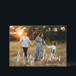 Elegant Script Photo Modern Christmas Holiday Card<br><div class="desc">Modern photo Christmas card featuring a simple and minimal design with the greeting "Merry Christmas" in an elegant white script along with your family name.  The back has a photo collage consisting of six square pictures.</div>