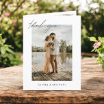 Elegant Script Photo Wedding Thank You Card<br><div class="desc">Express your heartfelt gratitude in timeless style with this Elegant Script Photo Wedding Thank You Card. Featuring refined calligraphy, a full photo layout, and minimalistic design elements, this card is the perfect way to thank your guests while showcasing a cherished moment from your big day. Ideal for modern, romantic, or...</div>
