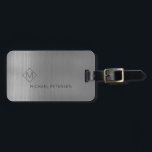 Elegant silver monogrammed name modern luggage tag<br><div class="desc">Modern luxury exclusive looking luggage tag on a faux metallic brushed silver grey background with geometric diamond shaped monogram. Personalize it with your name,  monogram,  and details on both sides!</div>