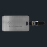 Elegant silver monogrammed name modern luggage tag<br><div class="desc">Modern luxury exclusive looking luggage tag on a faux metallic brushed silver grey background with geometric diamond shaped monogram. Personalize it with your name,  monogram,  and details on both sides!</div>