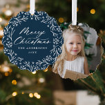 Elegant Snowflake Wreath Navy Photo Christmas Ornament Card<br><div class="desc">Elegant holiday photo ornament card featuring "Merry Christmas" displayed in a white calligraphy script encircled by a wreath of snowflakes and pine branches on a navy background. Personalize the front of the ornament card by adding your family name and the year. The back of the paper ornament features your favourite...</div>