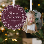 Elegant Snowflake Wreath Purple Photo Christmas Ornament Card<br><div class="desc">Elegant holiday photo ornament card featuring "Merry Christmas" displayed in a white calligraphy script encircled by a wreath of snowflakes and pine branches on a dark purple background. Personalize the front of the ornament card by adding your family name and the year. The back of the paper ornament features your...</div>