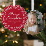 Elegant Snowflake Wreath Red Photo Christmas Ornament Card<br><div class="desc">Elegant holiday photo ornament card featuring "Merry Christmas" displayed in a white calligraphy script encircled by a wreath of snowflakes and pine branches on a red background. Personalize the front of the ornament card by adding your family name and the year. The back of the paper ornament features your favourite...</div>