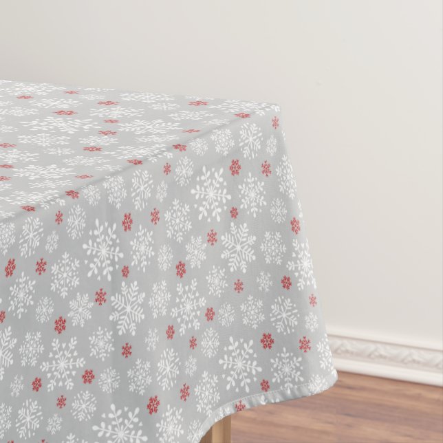Elegant snowflakes white and red on grey tablecloth (In Situ)