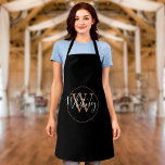 Elegant Stylish Black Gold Monogram Script Name Apron<br><div class="desc">Elegant stylish black and gold script monogram apron. You can personalize the name,  monogram and customize the font and colours to create your own unique design. Designed by Thisisnotme©</div>
