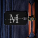 Elegant Stylish Black Grey Monogram Initial Script Luggage Tag<br><div class="desc">Girly Stylish Modern Elegant Black and Grey Monogram Initial Name Script Custom Personalized Personalized Luggage Bag Tag. This design featuring a first name in a pretty hand lettered swash tail font calligraphy (or typography) with monogram initial, address info in grey and white on black. These are easy to customize it....</div>