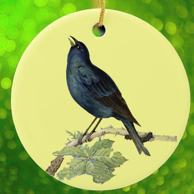 Elegant Vintage Black Bird Yellow Ceramic Ornament (Elegant singing black bird on branch with caterpillar leaves on yellow hanging ornament.)